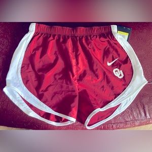 NWT Nike Dri Fit lined running short. Adult Sm. OU college emblem.